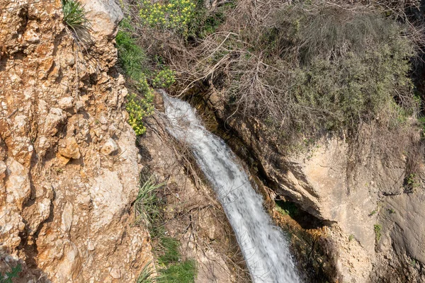 stock image HaEshed waterfall flows from a crevice in the mountain and is located in the continuation of the rapid, shallow, cold mountain Ayun river, in the Galilee, near Metula city, in northern Israel