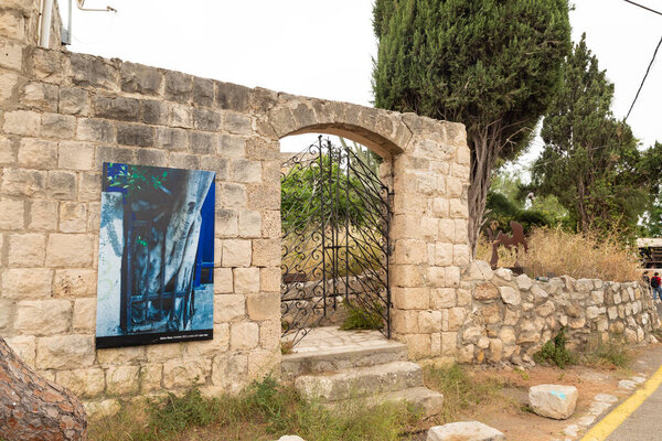 Haifa, Israel, June 03, 2023 : Ornamented decorative gates made of black metal in the famous artists village near Haifa in northern Israel