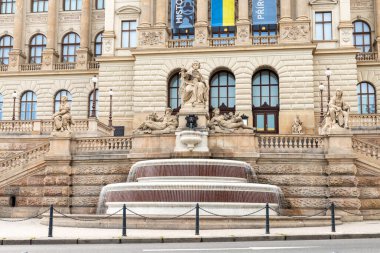 Prague, Czech Republic, May 12, 2024 : Decorative fountain in front of Peoples Museum on famous Wenceslas Square in Prague in Czech Republic clipart