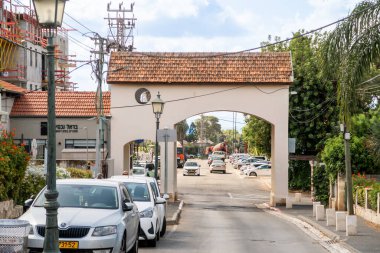 Zikhron Yaakov, Israel, September 19, 2024 : Stone arch at entrance to historic district in Zikhron Yaakov city in northern Israel clipart