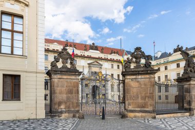 Prague, Czech Republic, May 12, 2024 : Decorative side iron gate to the New Royal Palace in Prague in Czech Republic clipart