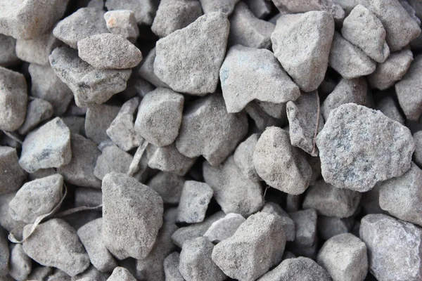 pile of gravel stones on a white background