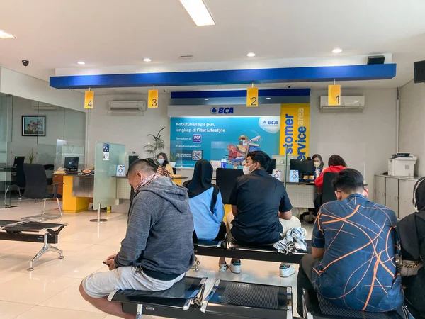 stock image Yogyakarta, November 10 2022. People queuing in the waiting room at the bank