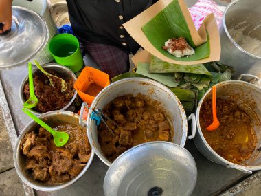 Gudeg seller on the roadside. Gudeg is one of the typical Indonesian foods with a variety of young jackfruit as the basic ingredients