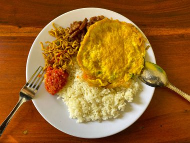 rice and omelet, food commonly found in warungs in Indonesia called burjo