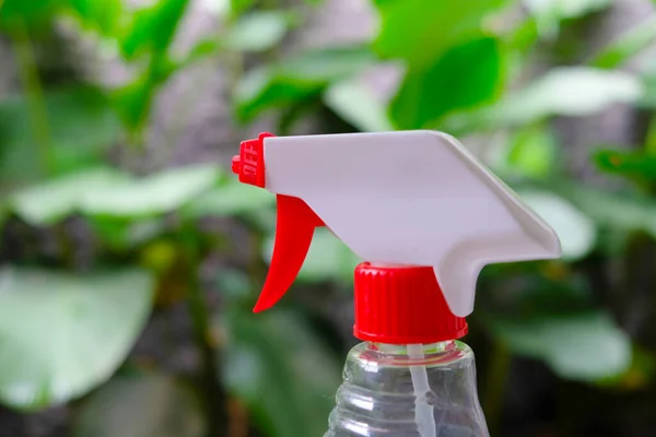 Spray Bottle Desinfenctant Blurred Plant Background — Stock Photo, Image