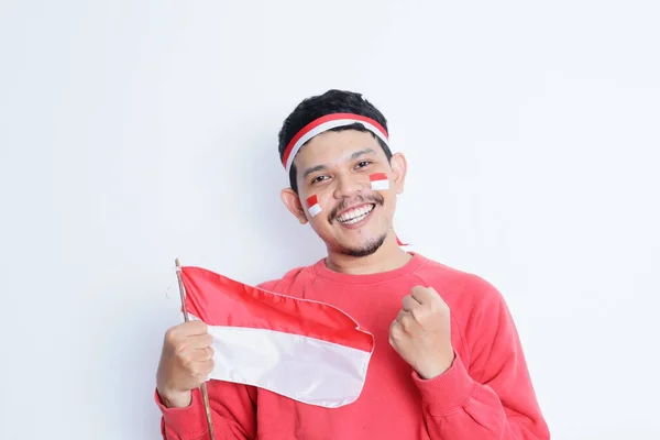 Indonesian Man Clenched Fist Carrying Red White Flag Showing Excitement — Stock Photo, Image