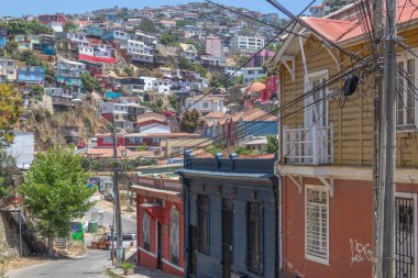 Valparaiso, Chile - Dec 5, 2022: Colorful houses in a poor neighborhood of Valparaiso, which has been declared as a World Heritage Site by UNESCO