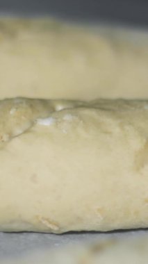 Vertical screen: Warm fresh bread in a bakery. Making bread and eco production. Dough Rises Fast. Cooking process in Time Lapse. Baking Italian bio bread in oven. High quality footage