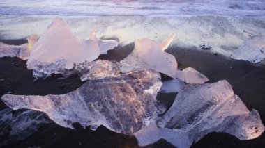 Ice Chunks On Black Volcanic Beach in Iceland Nature. High quality 4k footage