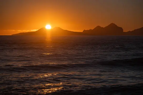 Sunrise over Stormy Sea, Shining Golden Waves with Sun Reflection at Sunset, Amazing light over Icelandic Nature