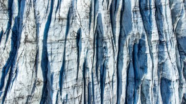 Vatnajokull Glacier in Iceland, Pure Blue Ice at Winter Season, Aerial View.