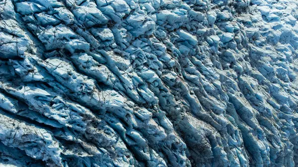 Vatnajokull Glacier in Iceland, Pure Blue Ice at Winter Season, Aerial View.