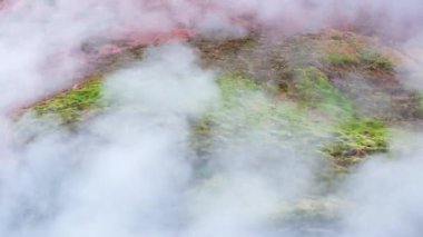 Geothermal area in Iceland, natural hot spring. Stunning boiling clear water in sulfur valley. Nature miracle beautiful landscape. Deildartunguhver thermal area. Shot in 8k resolution. High quality 4k