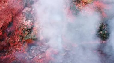 Geothermal area in Iceland, natural hot spring. Stunning boiling clear water in sulfur valley. Nature miracle beautiful landscape. Deildartunguhver thermal area. Shot in 8k resolution. High quality 4k