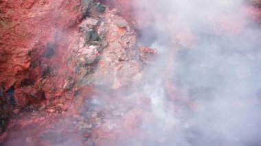 Geothermal area in Iceland, natural hot spring. Stunning boiling clear water in sulfur valley. Nature miracle beautiful landscape. Deildartunguhver thermal area. Shot in 8k resolution. High quality 4k