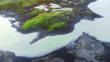 Aerial landscape with hills and glacier river in Iceland. Beautiful pure nature in north country. High quality photo
