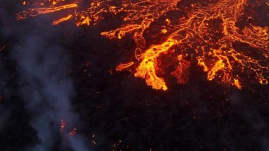 Volcano eruption in 2023, Red burning lava erupts from the ground in Iceland. Formation of a new active volcano. Aerial footage. High quality 4k footage