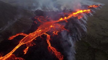 Volcano eruption in 2023, Red burning lava erupts from the ground in Iceland. Formation of a new active volcano. Aerial footage. High quality 4k footage