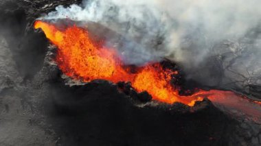 Volcano eruption in 2023, Red burning lava erupts from the ground in Iceland. Formation of a new active volcano. Aerial footage. High quality 4k footage