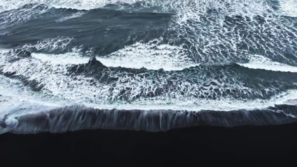 Aerial View Black Sand Volcanic Beach Crashing Waves Serene Tranquil — Stock Video