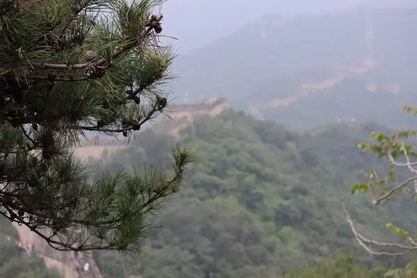 The Great Wall of China is an ancient fortification that stretches over 13,000 miles across northern China. Originally built to protect Chinese states from invasions and raids. High quality photo
