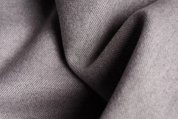 Yün kumaş, yün, gri ringa kemiği dokuması. Tekstil. Yaratıcılık için reklam ürünleri pankartı.