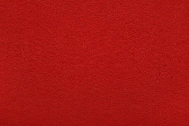Kırmızı keçeli kumaş arka plan - yumuşak kumaş yüzeyinin yakın çekimi. Kusursuz arkaplan, grafik tasarımı, yapıştırma kitabı, tekstil düzeni, yaratıcı projeler.