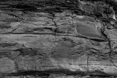 Old Aged Shabby Cliff Face And Divided By Huge Cracks And Layers. clipart