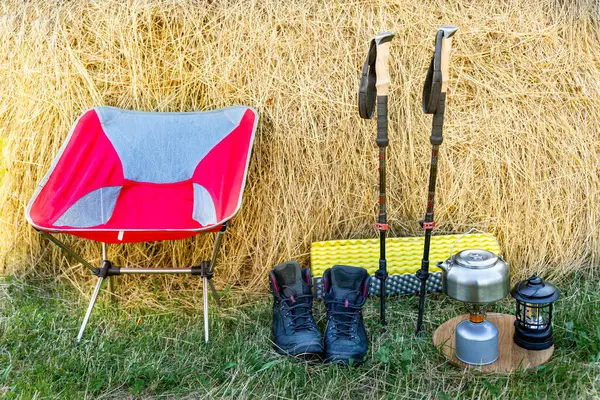 stock image Hiking with a backpack and trekking poles in the mountains. Camping and trekking equipment