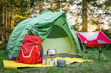  Equipment for camping and hiking in the mountains in summer. clipart