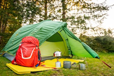  Equipment for camping and hiking in the mountains in summer. clipart