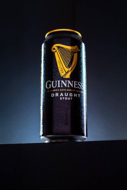 Can of beer Guinness hero on a black background