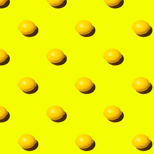 stock image Seamless pattern fresh whole lemon on yellow background