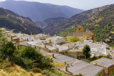 Panoramic view of a town in the Sierra Nevada in Granada clipart