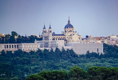 Sunset image of the Almudena Cathedral in Madrid clipart