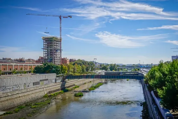 stock image Banks of the Manzanares River in the city of Madrid with lots of trees