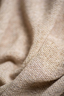Görünür Dokuma Doğal Bej Tekstil Dokusuna sahip Katlanmış Kırsal Kumaş.