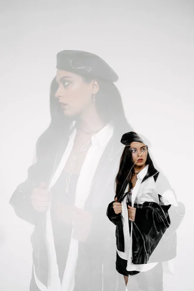 portrait of a young beautiful women. studio shot on white.