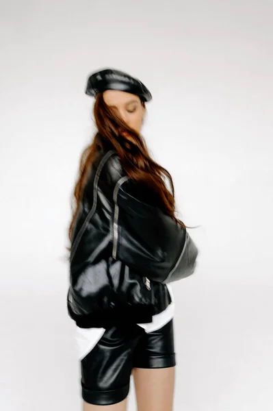 young sexy female in black clothes