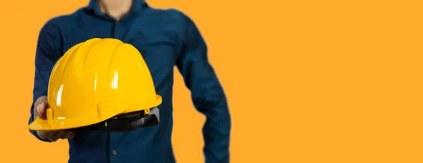 Engineer Blue Shirt Helmet Yellow Background Safety First — Fotografie, imagine de stoc