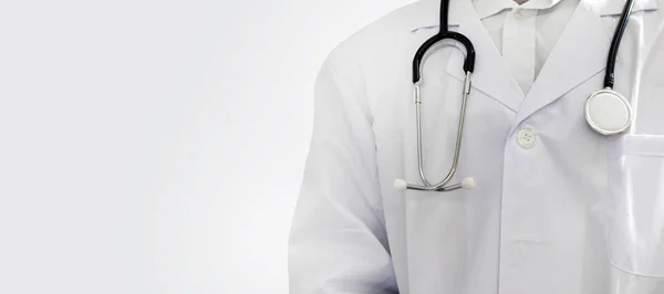 stock image A half-standing doctor, without a face, holding a stethoscope against a white background.stand straight