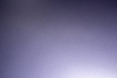 Mavi-gri yüzeyin kaba bir dokusu var. Bir mat yüzeyi ile yansıtıcı