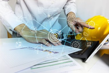 Üretim ve üretim teknolojisini birbirine bağlayan iş hedefleri ve proje yönetimi belirleyen mühendisler