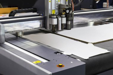 Manufacturing machinery in the paper industry, including paper cutting for packaging in the packaging industry.