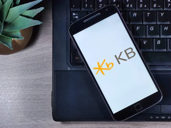 stock image KB Kookmin Bank mobile app icon on phone screen.