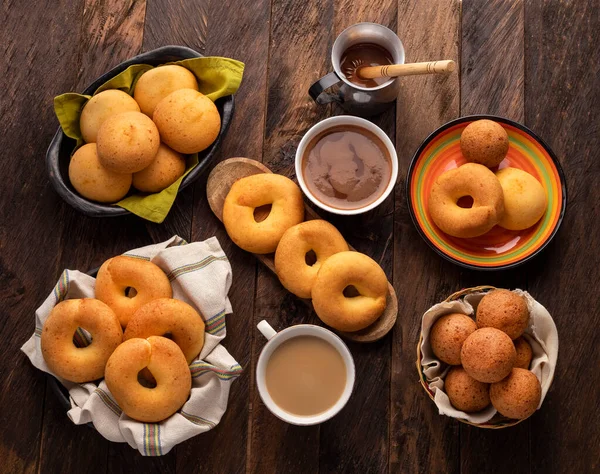 Stock image pandequeso, bunuelo, almojabana, coffee and chocolate - Typical Colombian breakfast