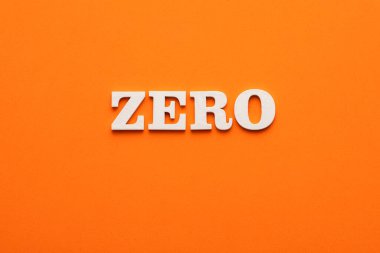 Sıfır kelime turuncu köpüklü arka planda beyaz harflerle