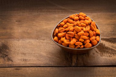 Crunchy salty chili corn - Zea mays. Toasted snacks in the bowl