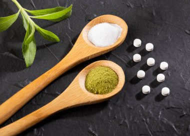 Natural organic stevia leaves, powder and pills - Stevia rebaudiana